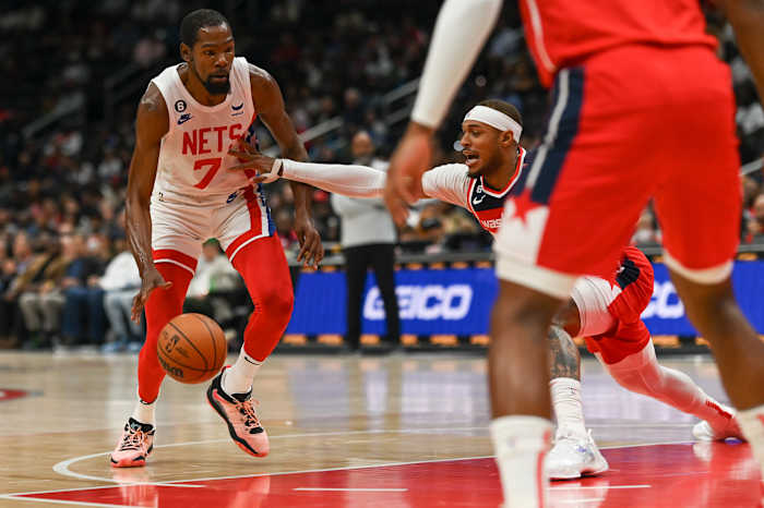 KD looking to drive the lane by Daniel Gafford. Photo Credit: USA Today Sports
